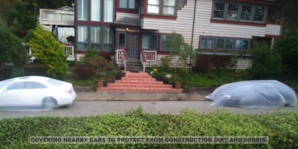 Armstrong Roofing - protection of cars near a home where spf roofing will be installed