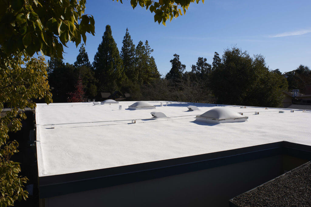 Armstrong Foam Roofing - flat residential roof protected with spf foam roofing system