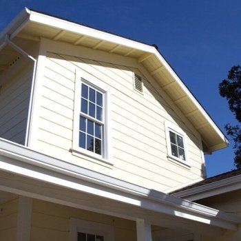 Armstrong Painting - exterior of a two-storey home painted ivory