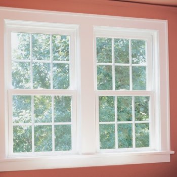 Armstrong Windows - sitting room with double white vinyl replacement window