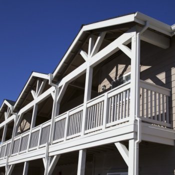 Armstrong Painting - exterior painting of a home with a long white balcony