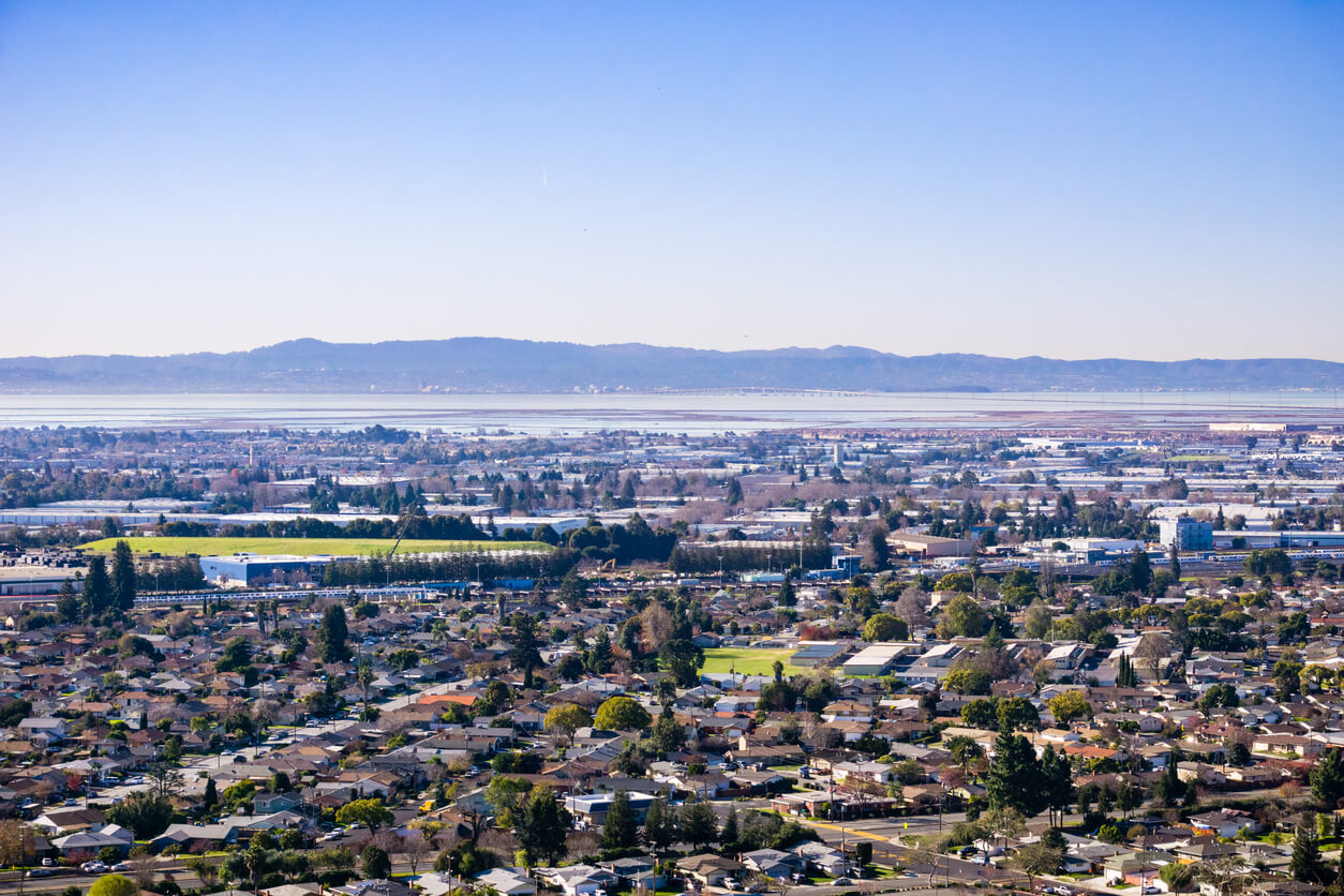 View towards the towns of east bay; San Mateo bridge on the background, San Francisco bay area, Hayward, California